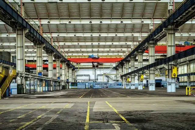 Huge empty warehouse soon to be stocked with shipment for shipping companies in dubai