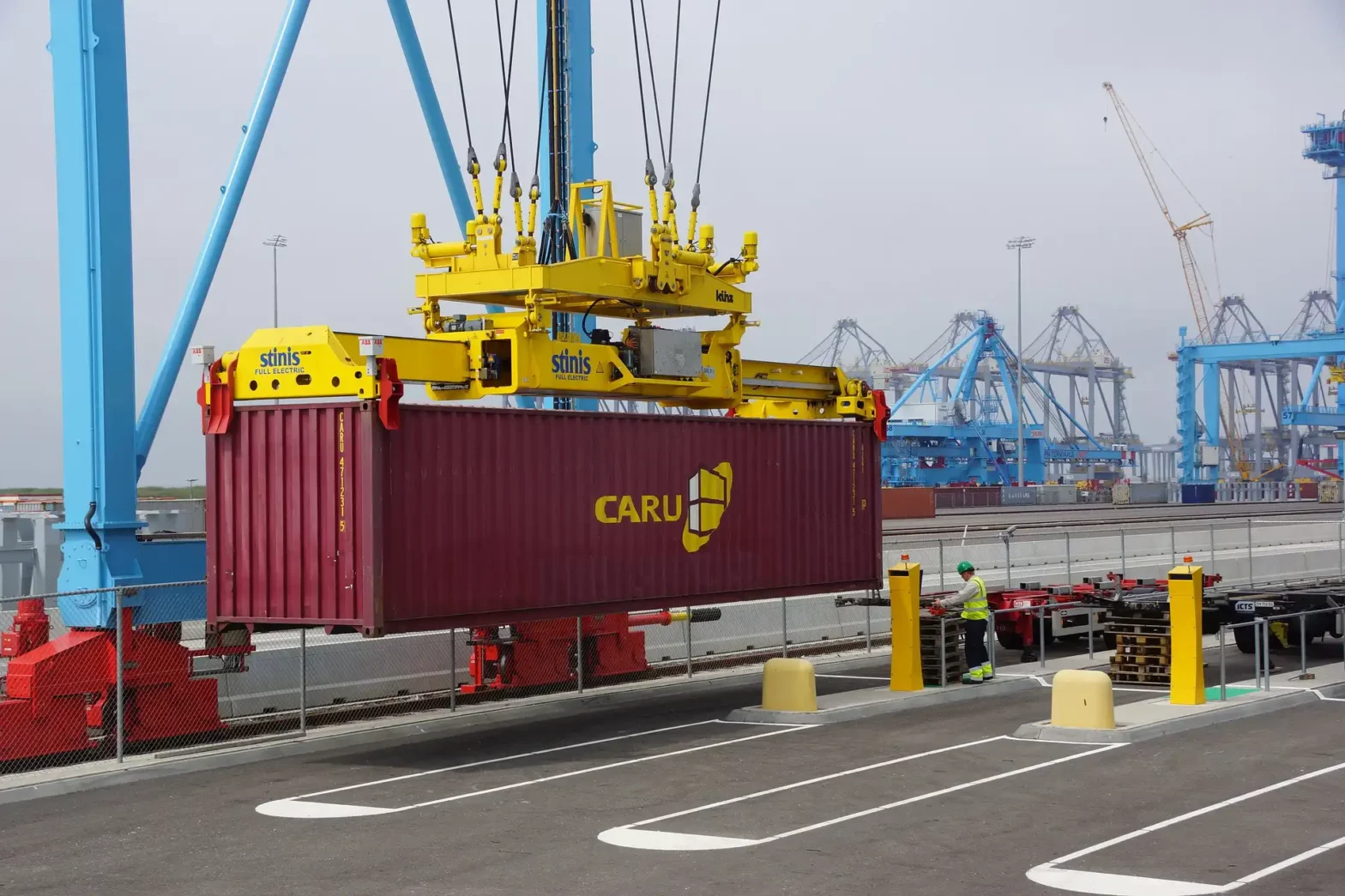 Container being lifted in air with heavy duty machinery for a logistic company in dubai