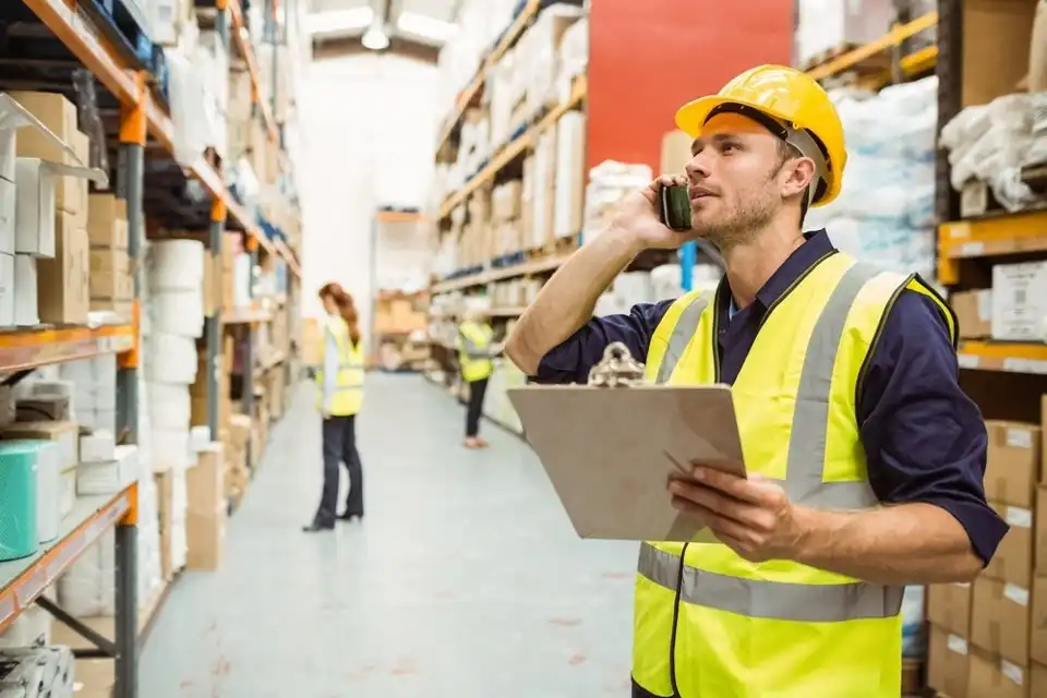Supply chain management by senior managers inside a warehousing facility in dubai