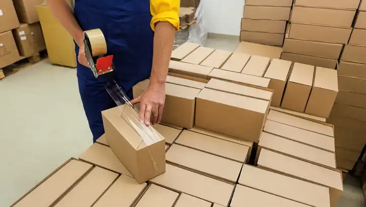 Packing and sealing the packages of customers of a dubai logistics company